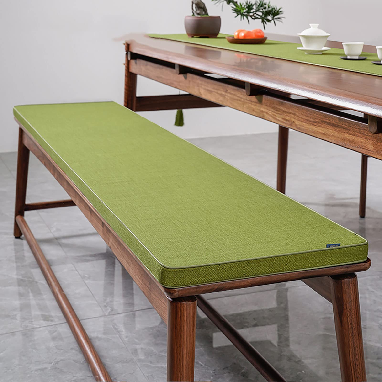 Coussin pour banc de jardin qui résiste aux taches grâce à sa housse verte déhoussable 80x30
