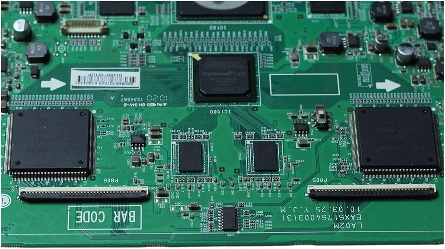 Close-up of the T-Con board showing ribbon cable connectors