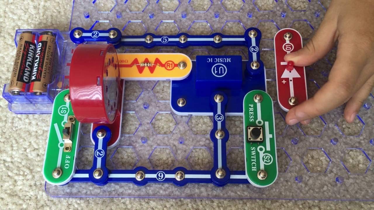 Assembled Music Box Snap Circuits project with hand