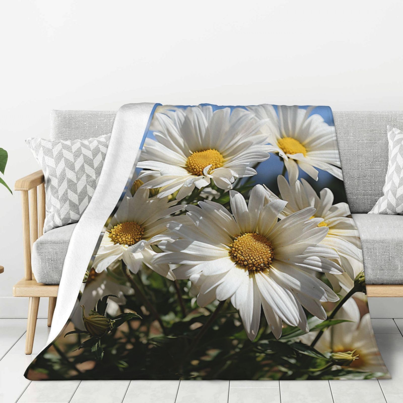 Plaid flanelle marguerites pour vos soirées canapé cocooning