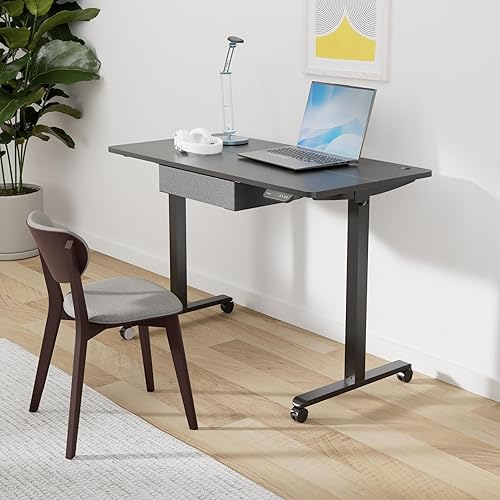 Vista 30 de CubiCubi Escritorio de pie con cajón, escritorio eléctrico de altura ajustable de 55 x 24 pulgadas, estación de trabajo ergonómica para computadora