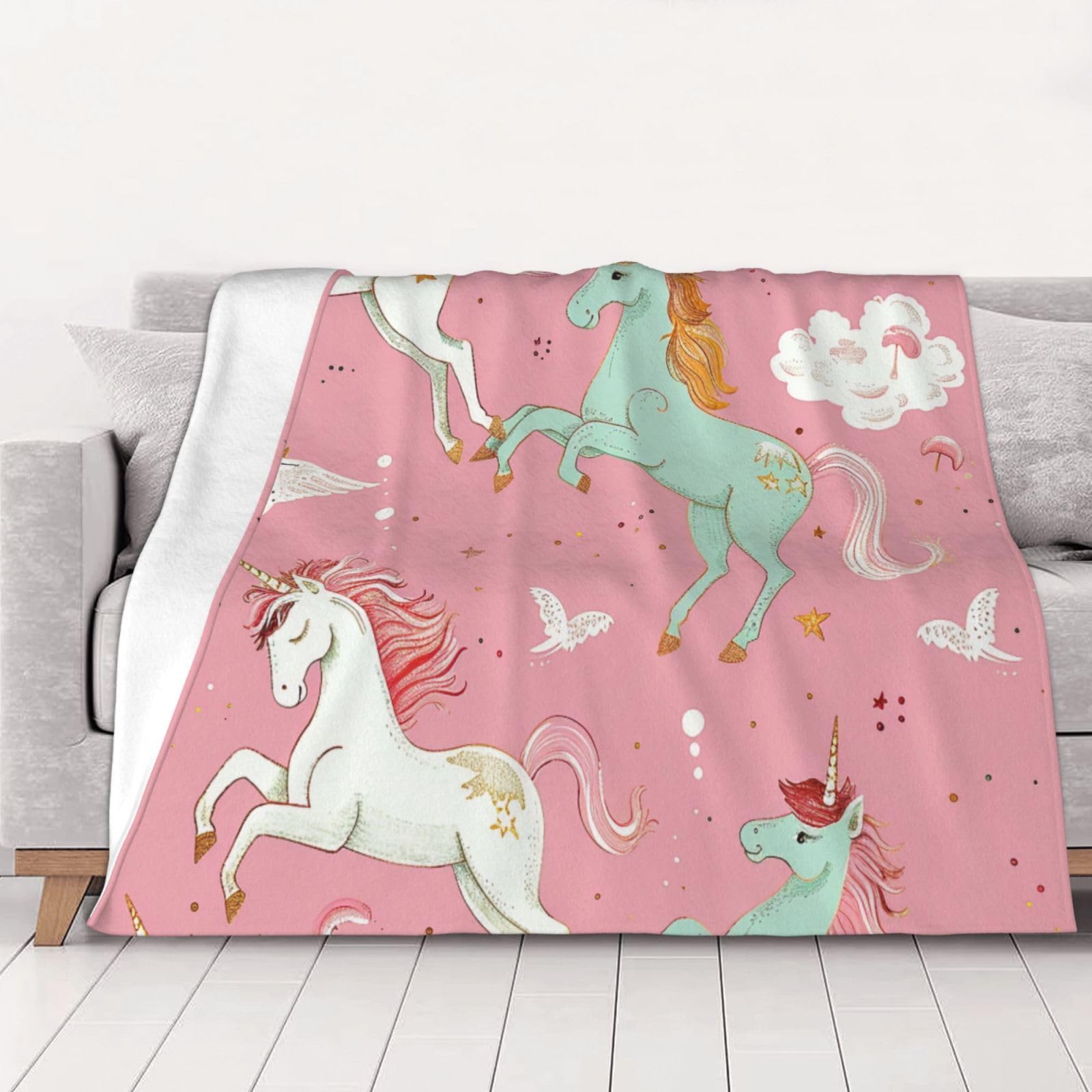 Couverture en flanelle licorne rose pour des soirées cocooning sur le canapé