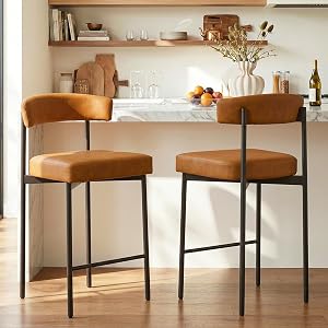 Counter Stools We're Absolutely Obsessed With (All on Amazon) GrandNoor Modern Brown Faux Leather Bar Stools, Set of 2