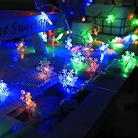 Vista 2 de CESOF Luces de Navidad multicolor de 20 pies 40 LED multicolor con copos de nieve, funciona con pilas, luces de hadas coloridas para dormitorio