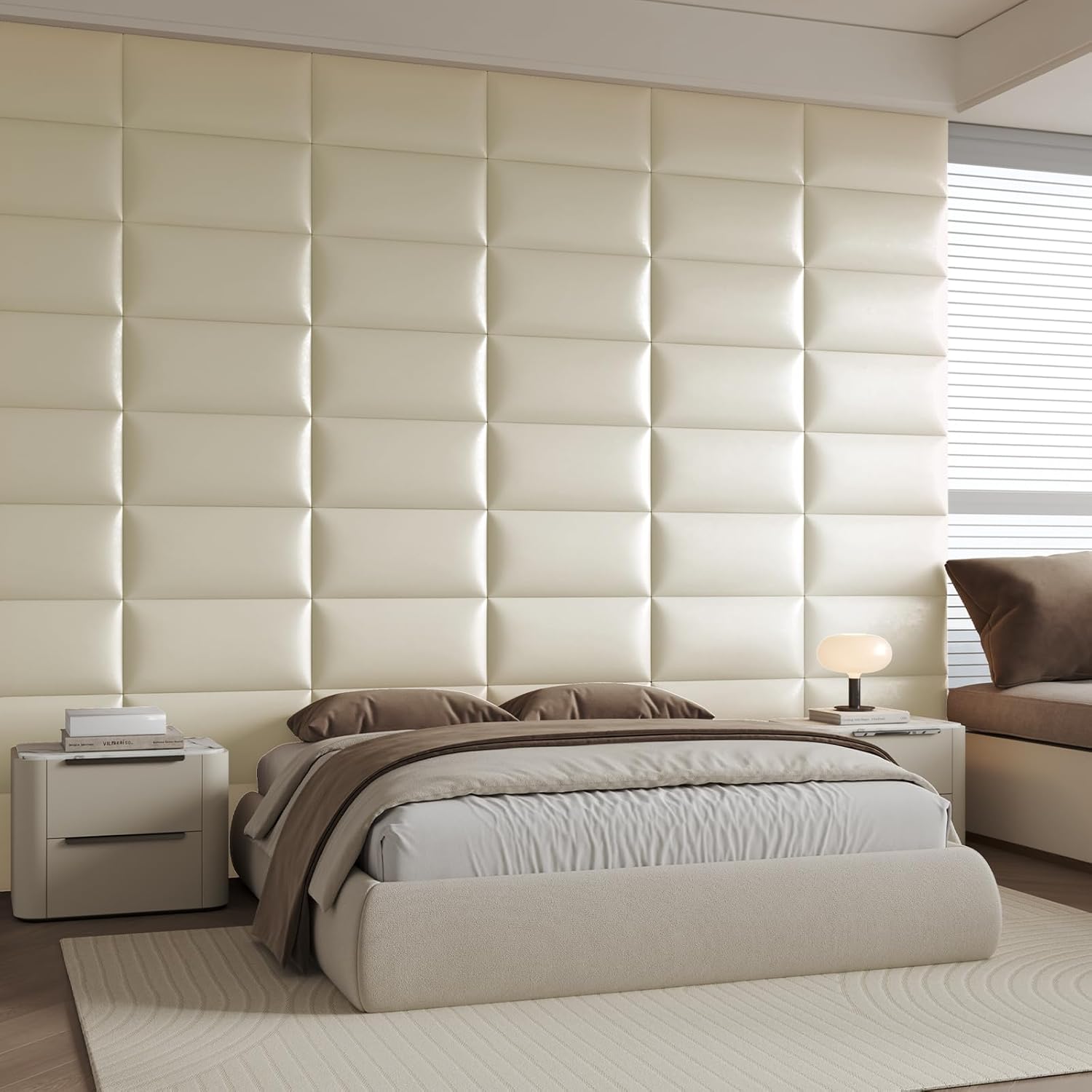 Woman measuring wall for headboard installation