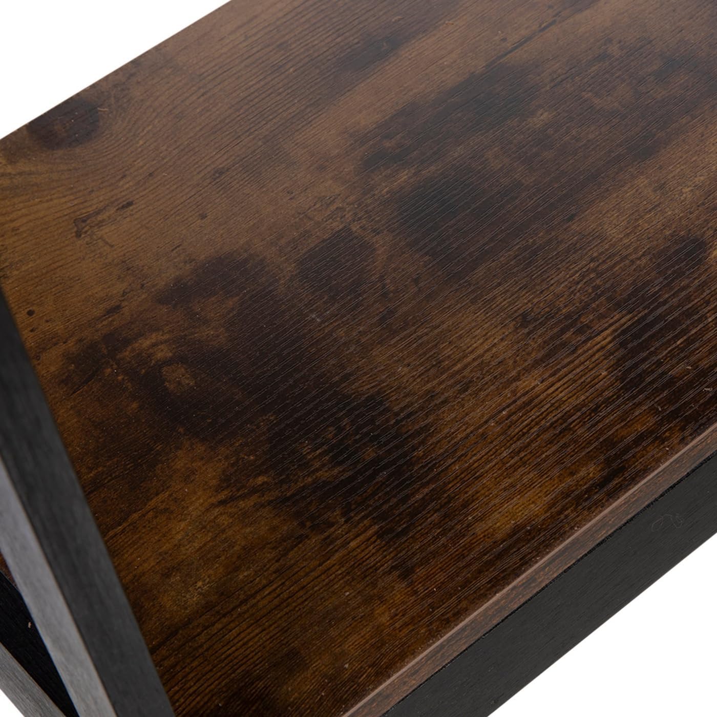 Close-up view of the wooden shelf surface of the Hobby Lobby over-toilet organizer, showing its texture and finish.