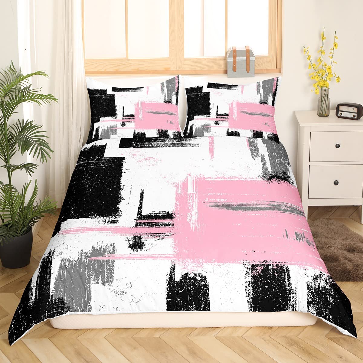 Housse de couette abstraite noir et rose pour relooker la chambre des enfants