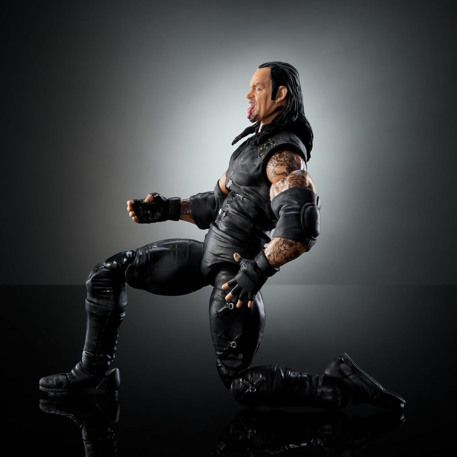 Mattel WWE Ultimate Edition Action Figure & Accessories Set, Undertaker 6-inch Collectible with 30 Articulation Points, Swappable Pieces & Entrance Gear