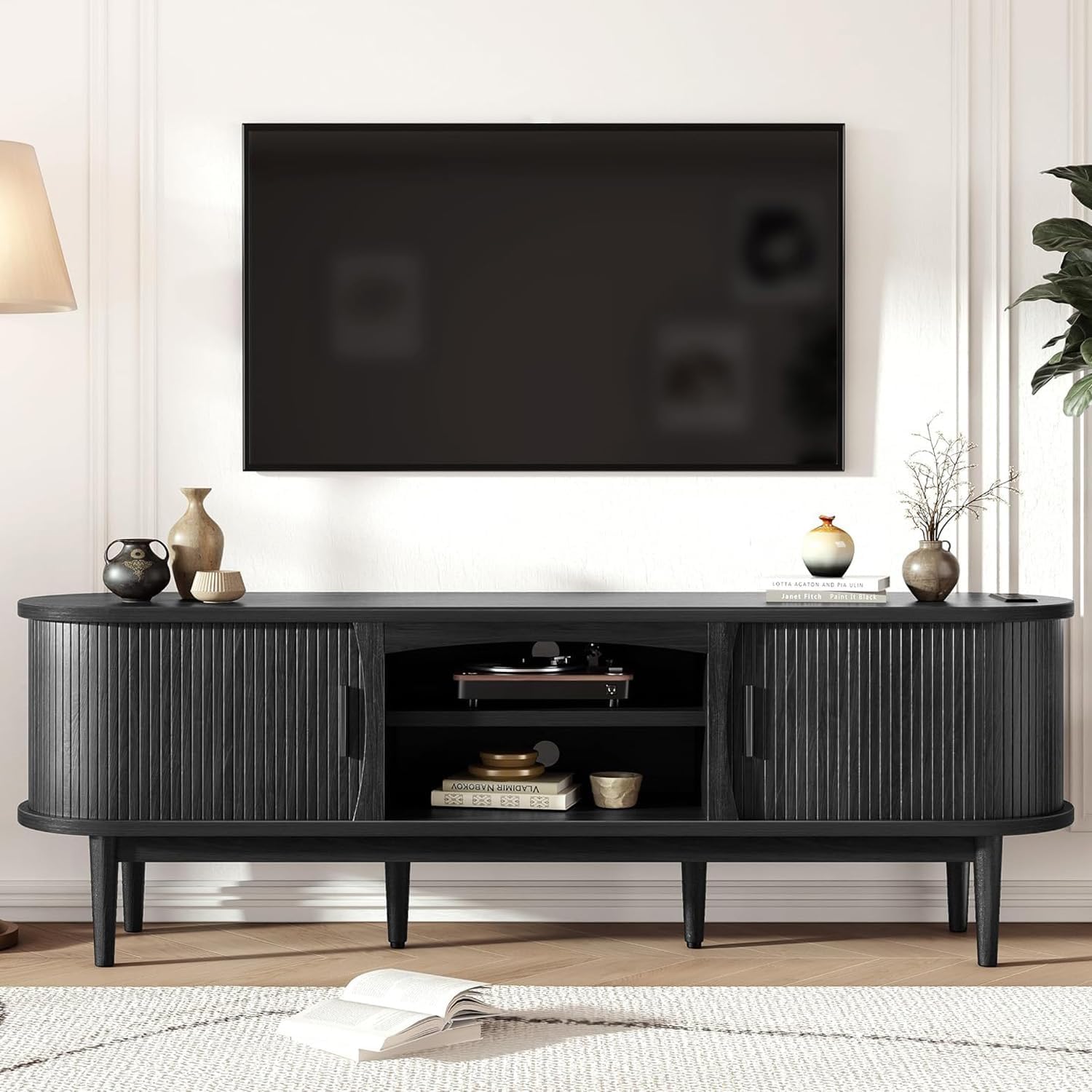 Decofy Mid Century TV Stand for TVs up to 80 Inches, Entertainment Center with Storage, Power Outlet, Fluted Sliding Doors & Adjustable Shelves, Modern Media TV Console Table for Living Room (Black)