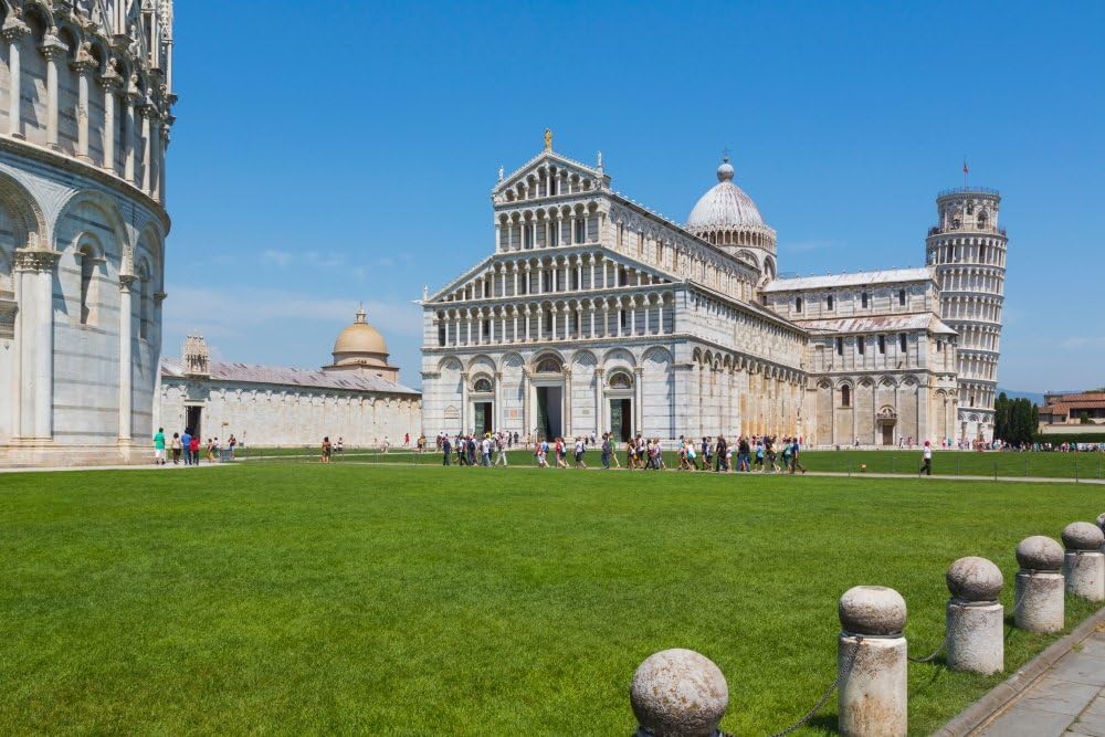 Pisa Pisa Province Tuscany Italy Campo dei Miracoli or Field of Miracles Also known as the Piazza del Duomo The cathedral or Duomo and its belltower (campanile) known as the Leaning Tower of Pisa The