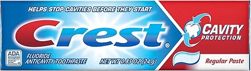 Crest Cavity Pasta de dientes regular, tamaño de viaje, 0.85 onzas (paquete de 24)