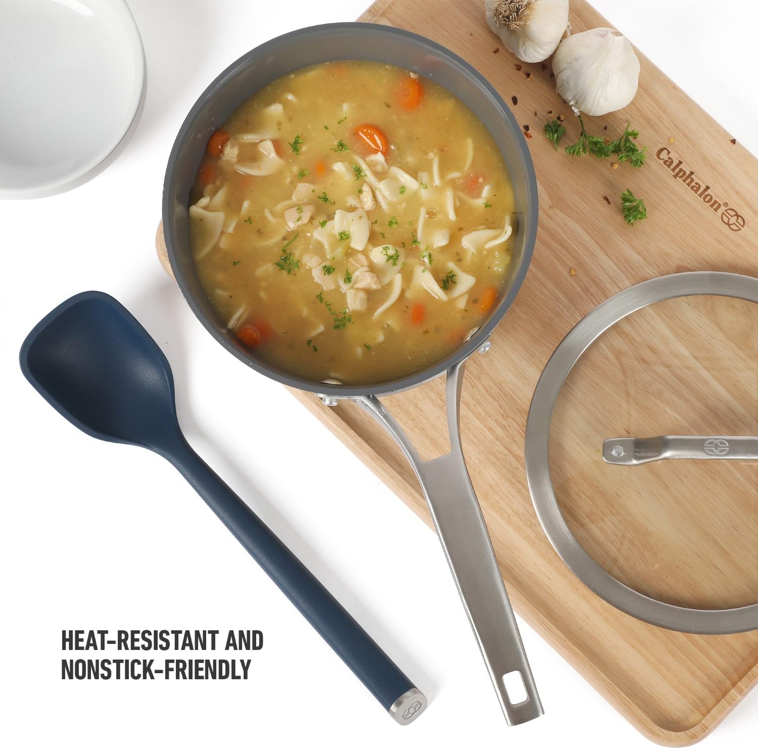 Calphalon Edge Silicone Spoon, Flexible Silicone Cooking Spoon with Reinforced Core, Heat-Resistant Nonstick-Safe Kitchen Spoon for Stirring, Mixing & Serving, Navy