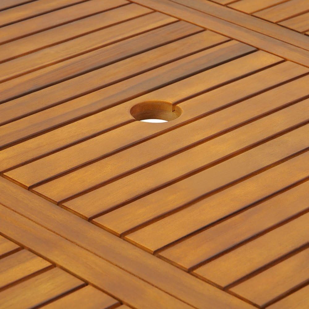 The garden table in its folded, upright position for storage.