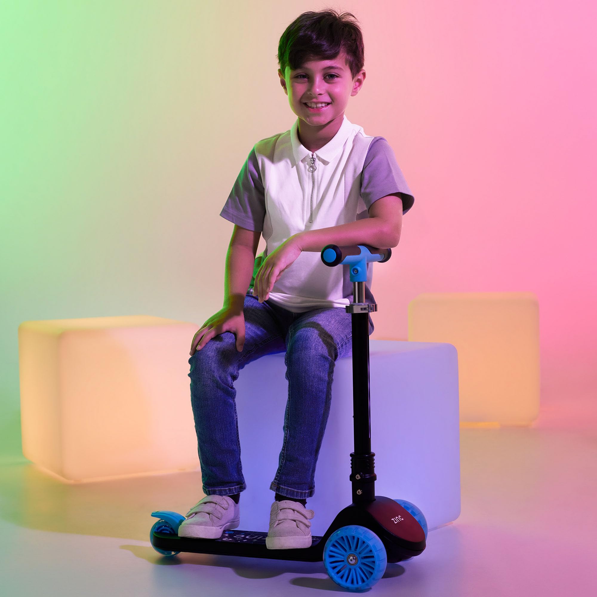 Zinc T-Motion Shine - Patinete para niños a partir de 3 años, plegable de tres ruedas para niños y niñas con cubierta y ruedas con luz LED, manubrio ajustable, controles de inclinación y dirección,