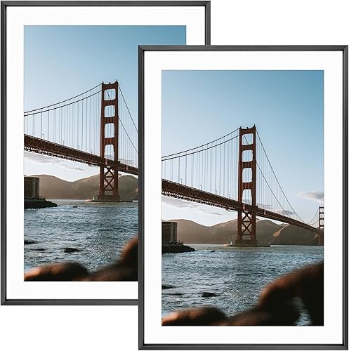 Vista 69 de Frametory - Colección de marcos de metal para fotos, marco de aluminio para fotos con alfombrilla de color marfil y cristal real Dorado