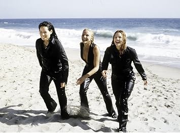 Film still of Lucy Liu Cameron Diaz Drew Barrymore on a beach in Charlies Angels Photo Print 10 x 8