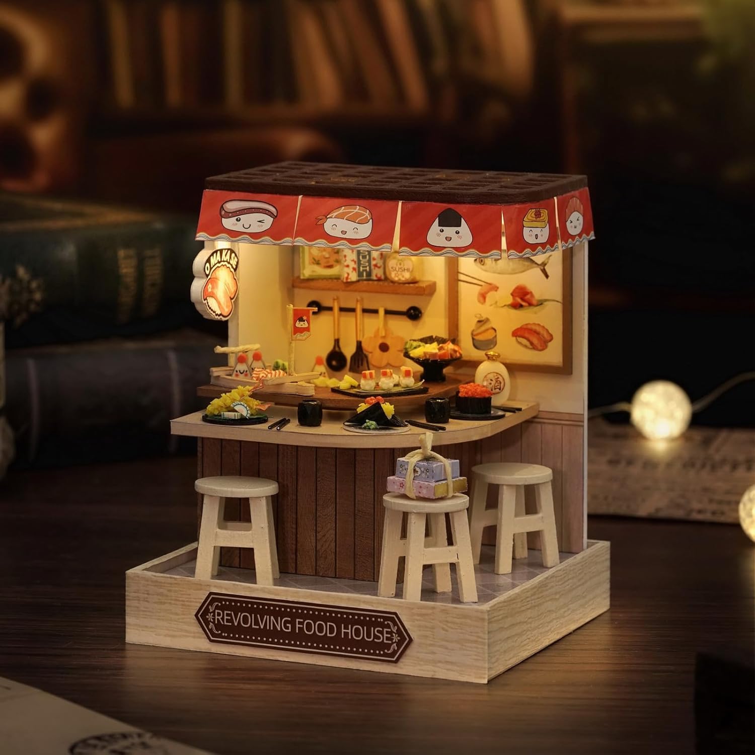 Revolving Food House illuminated at night
