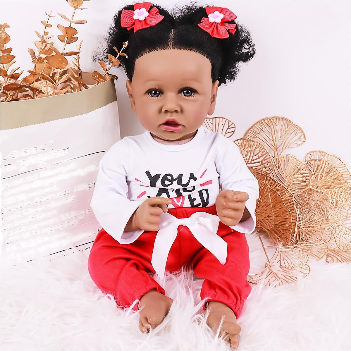 Lifelike Black Reborn Baby Dolls 22 Inch Baby Soft Body Realistic Newborn Baby Dolls African American Real Life Baby Dolls Cloth Body Doll Toy Gift for Kids Age 3+