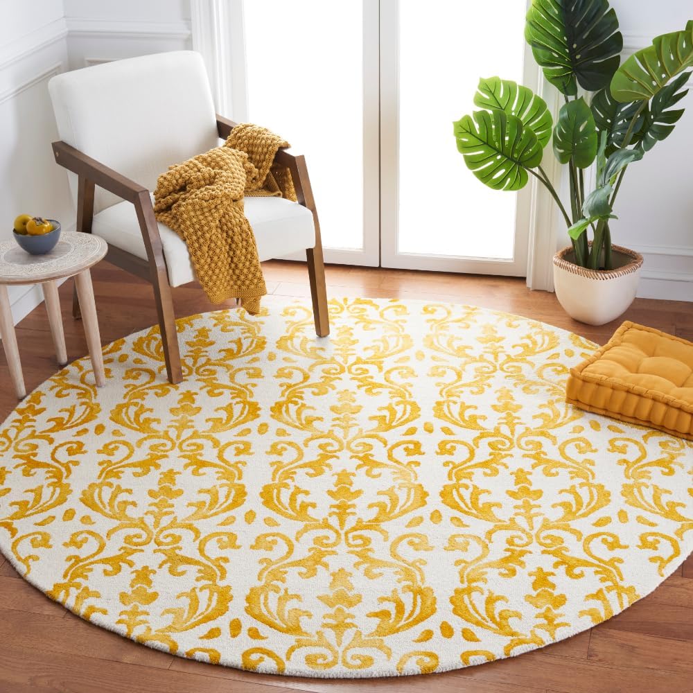 SAFAVIEH Dip Dye Collection Area Rug - 7' Round, Ivory & Gold, Handmade Wool, Ideal for High Traffic Areas in Living Room, Bedroom (DDY689A)