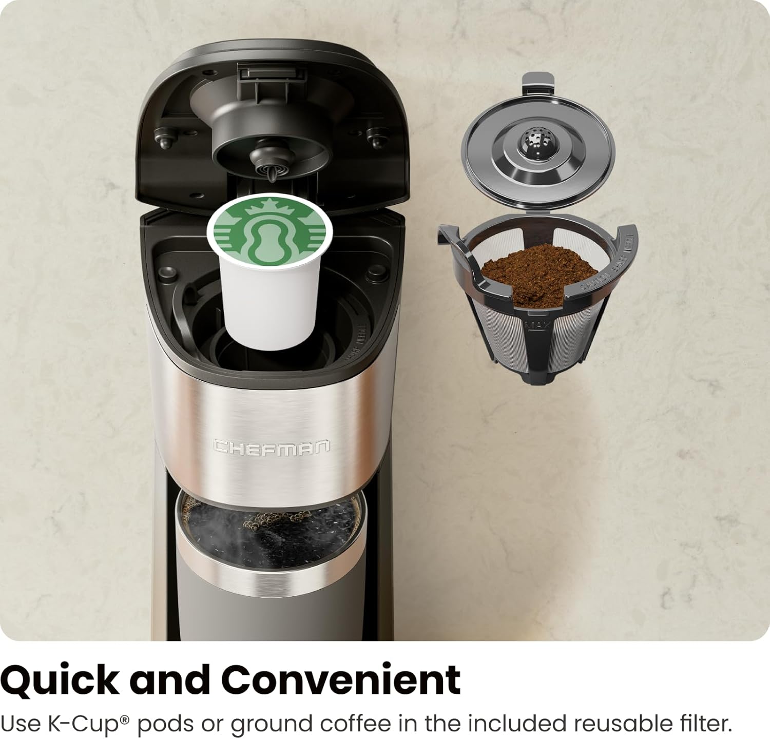 Жогорку view of the Chefman coffee maker with the lid open, showing a K-Cup pod inserted and the reusable ground coffee filter with grounds next to it.