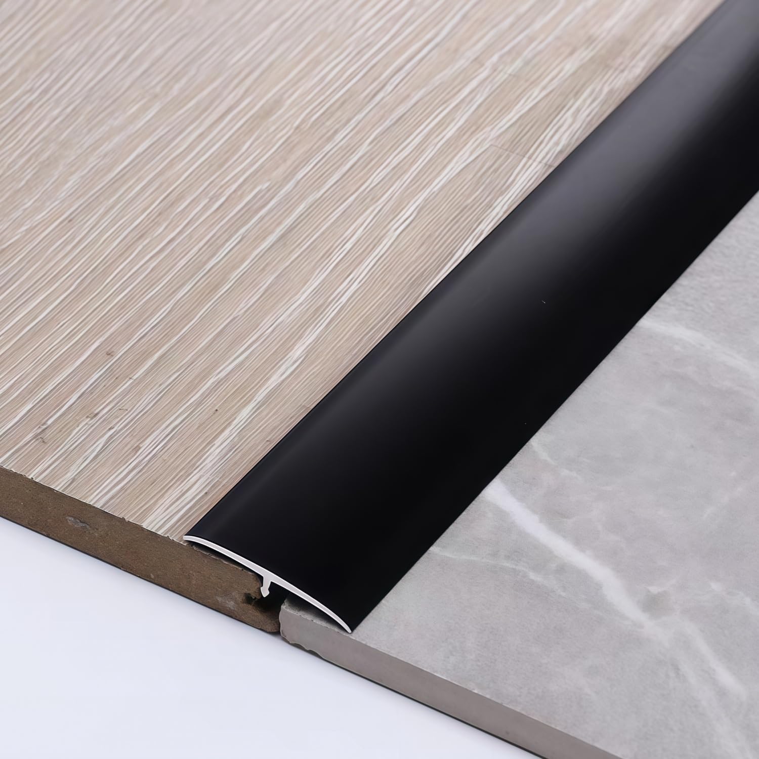 Tira de transición de aluminio de 33 mm para rematar juntas de suelos laminados y baldosas