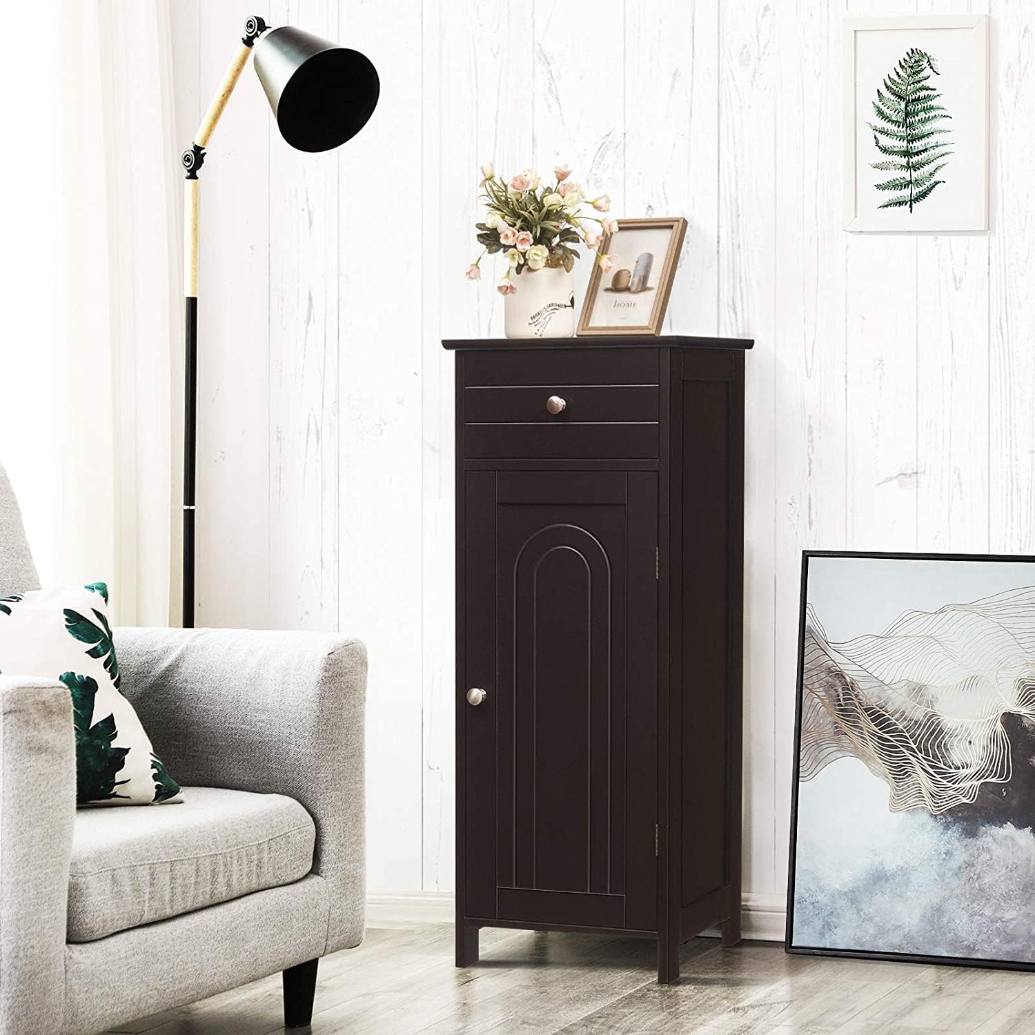 Hysache HW66372 cabinet placed in a living room setting next to an armchair, with decorative items on top.