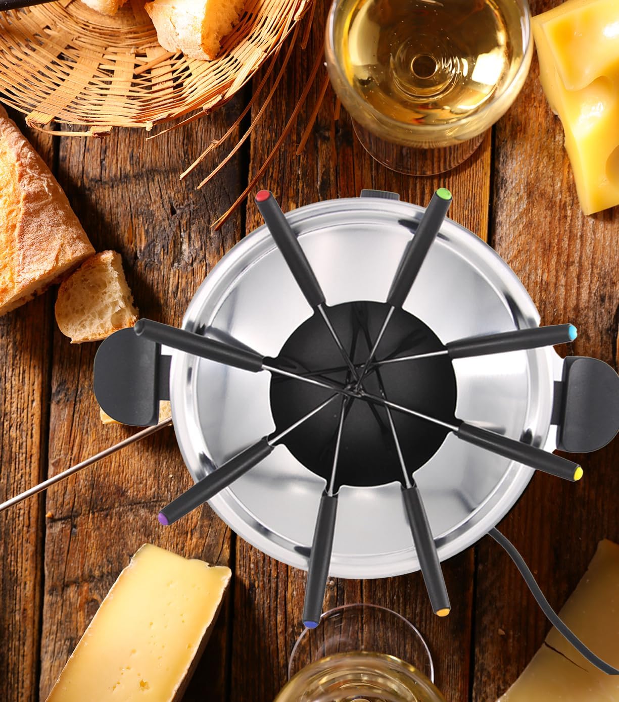 De dalt a baix view of the fondue pot with forks