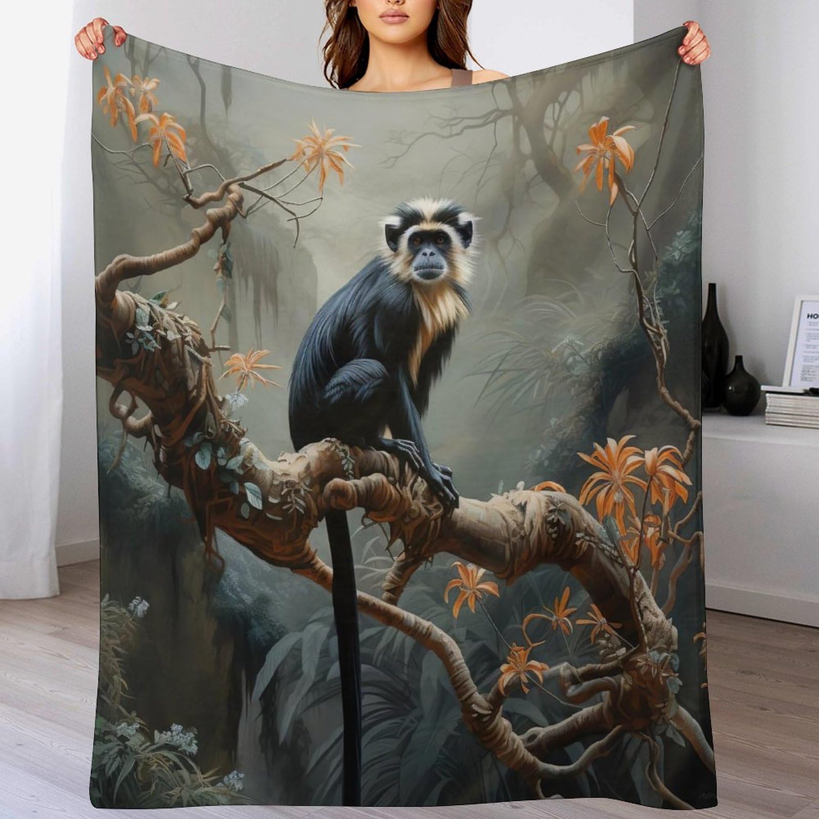 Couverture jeté flanelle singe pour une sieste cocooning sur la chaise à repos