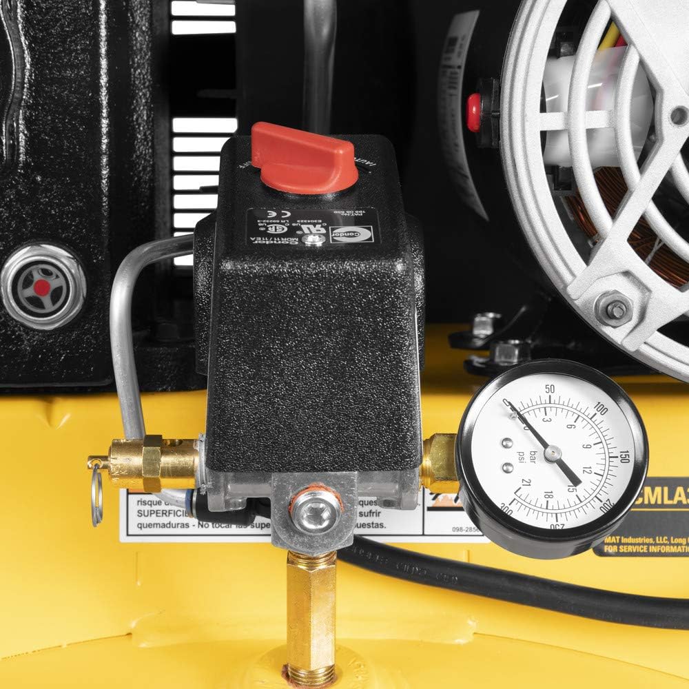 Close-up of the pressure gauge and on/off switch on the DeWalt air compressor