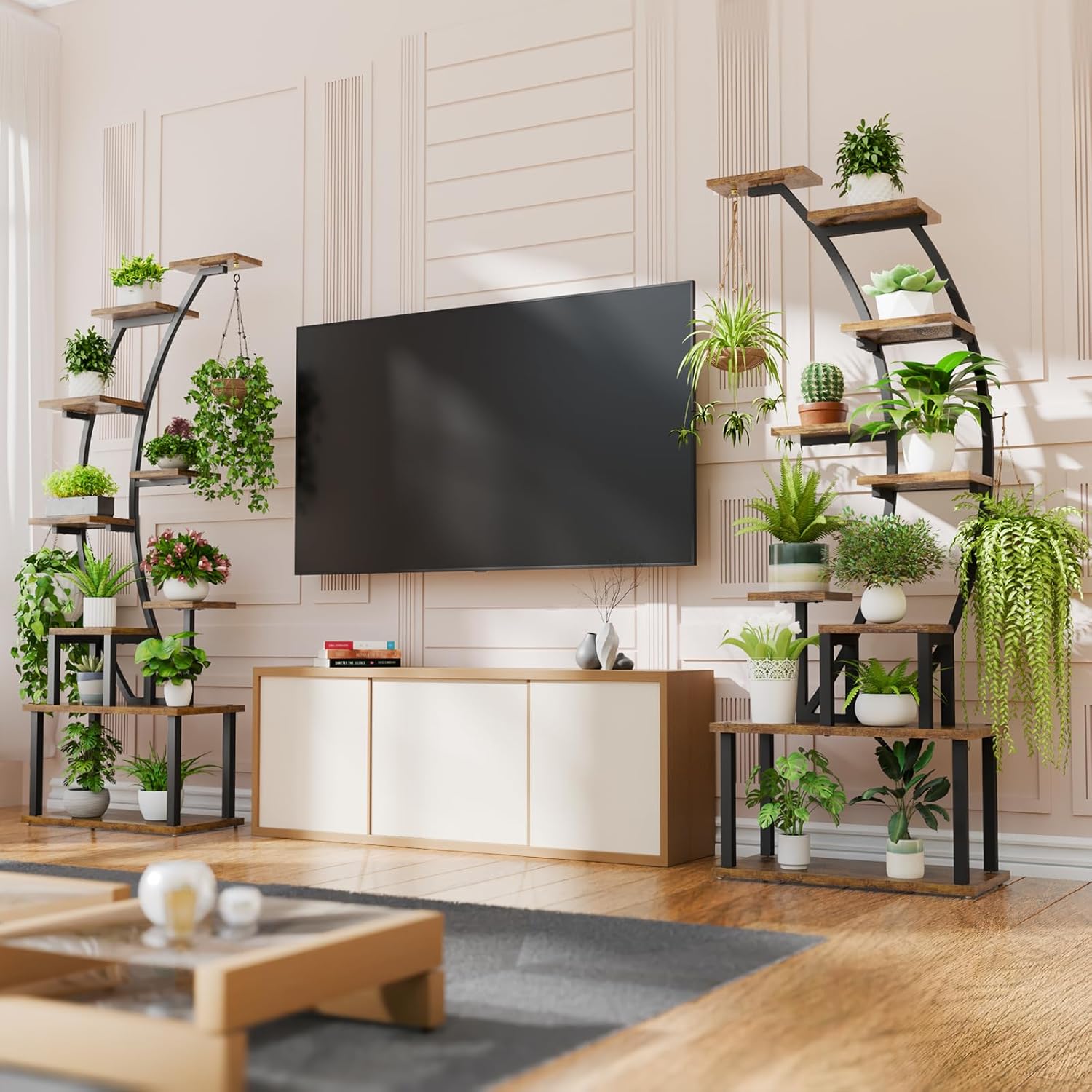 Two BACEKOLL plant stands used as decorative shelving units flanking a television.