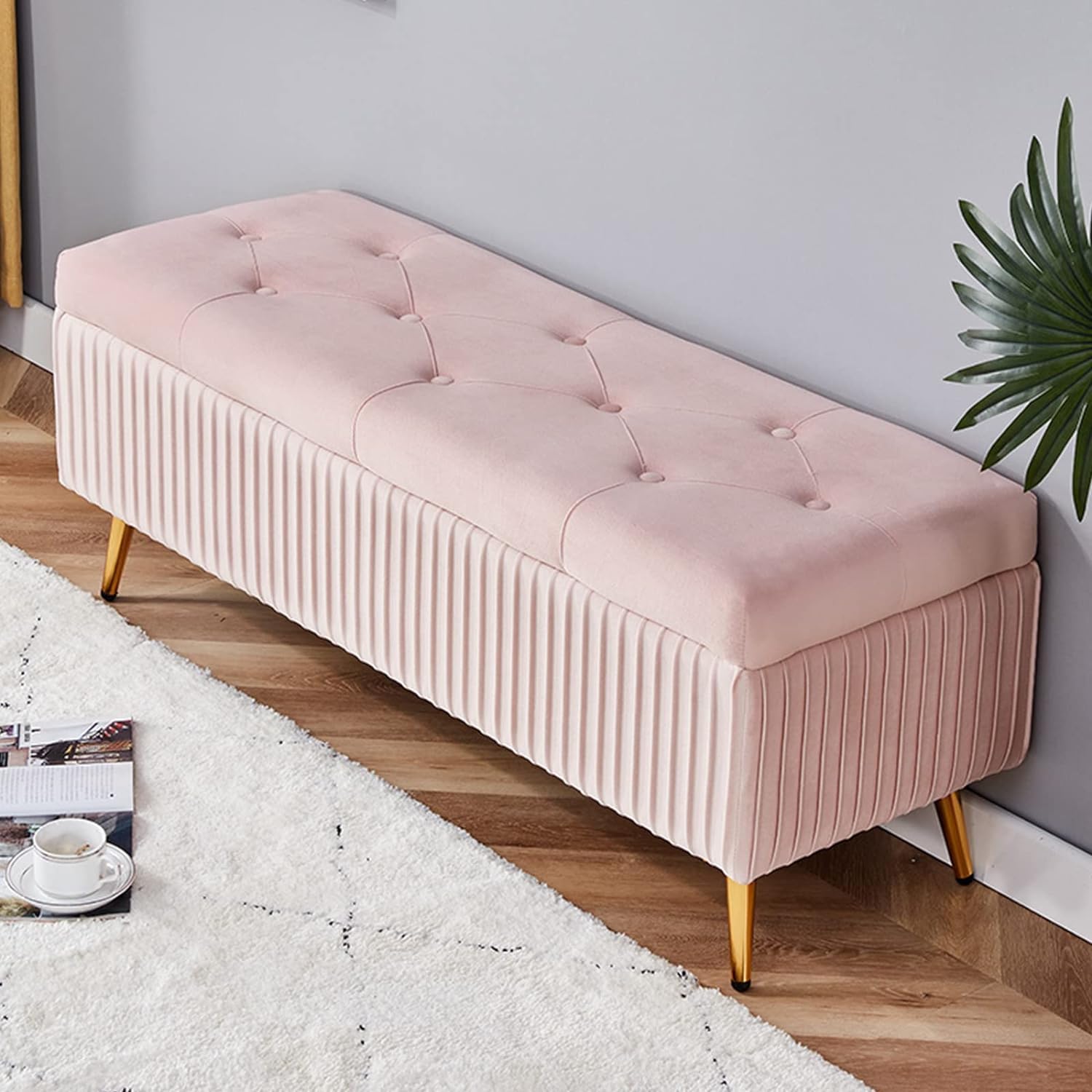 Tabouret à langer rose capitonné pour simplifier votre rangement