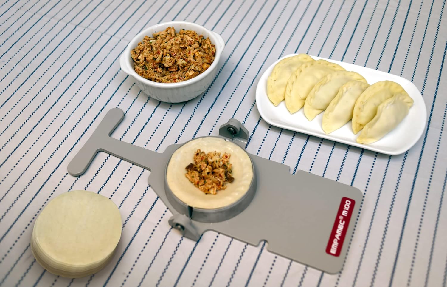 Empanada Maker EMPAMEC dough size diameter 5” (13 Cm) TO BE USED WITH WHEAT FLOUR (Harina de trigo) Makes 100 empanadas per hour. Close and stamp on a professional way.