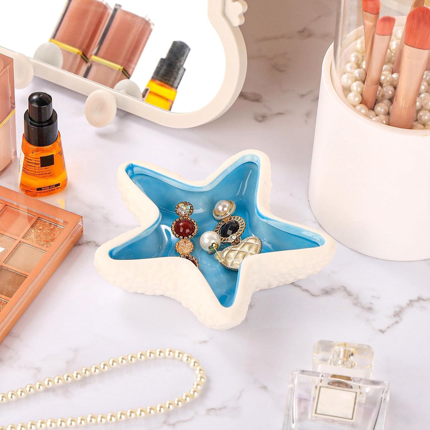 Condition photo showing New/Like New for whjy blue ceramic starfish trinket dish, beachy room decor aesthetic jewelry holder dish, beachy décor, trinket bowl, entryway bowl for keys, cute jewelry dish for desk
