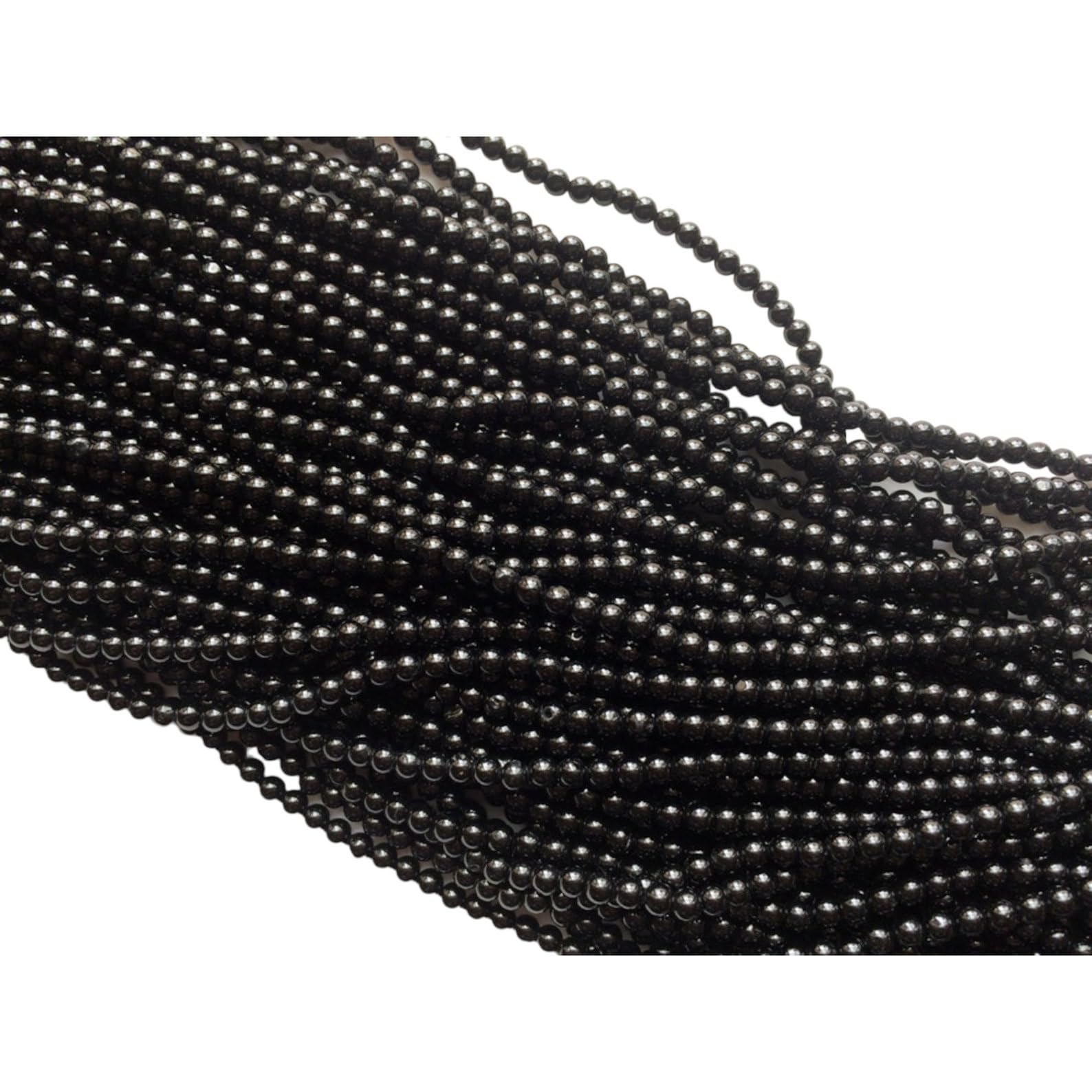 Spinelle noire perles rondes 4mm : fini les pierres ternes pour vos bijoux