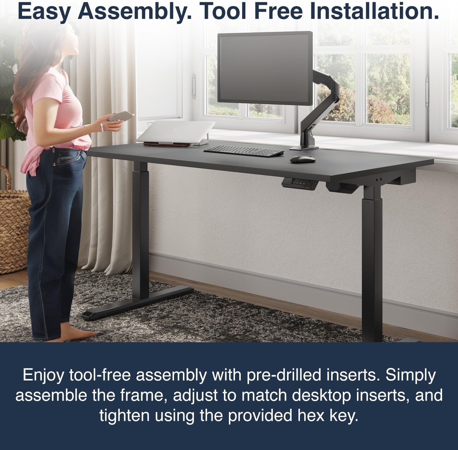 Woman assembling a Desky Single Sit Stand Desk, highlighting the tool-free installation process with pre-drilled inserts and a hex key.