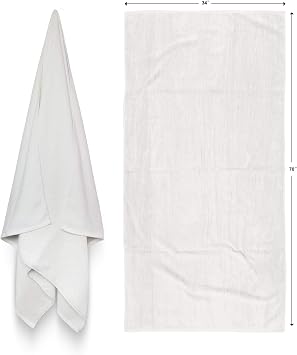 Royal Comfort Over-Sized 34x70 Solid Color 4 per Pack White Terry Velour Beach Towel. Made with 100% Cotton Weighing at 19.0 lbs per doz. Why Settle for Polyester get The Real Thing!