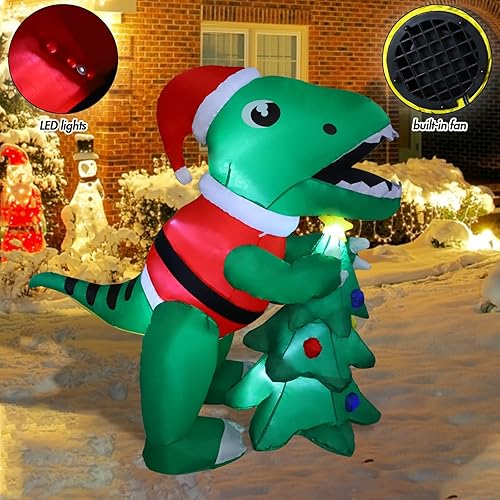 Miniatura 4 de MorTime Dinosaurio inflable de Navidad de 5 pies con caja de regalo, accesorio inflable para patio, dinosaurio verde animado iluminado con sombrero