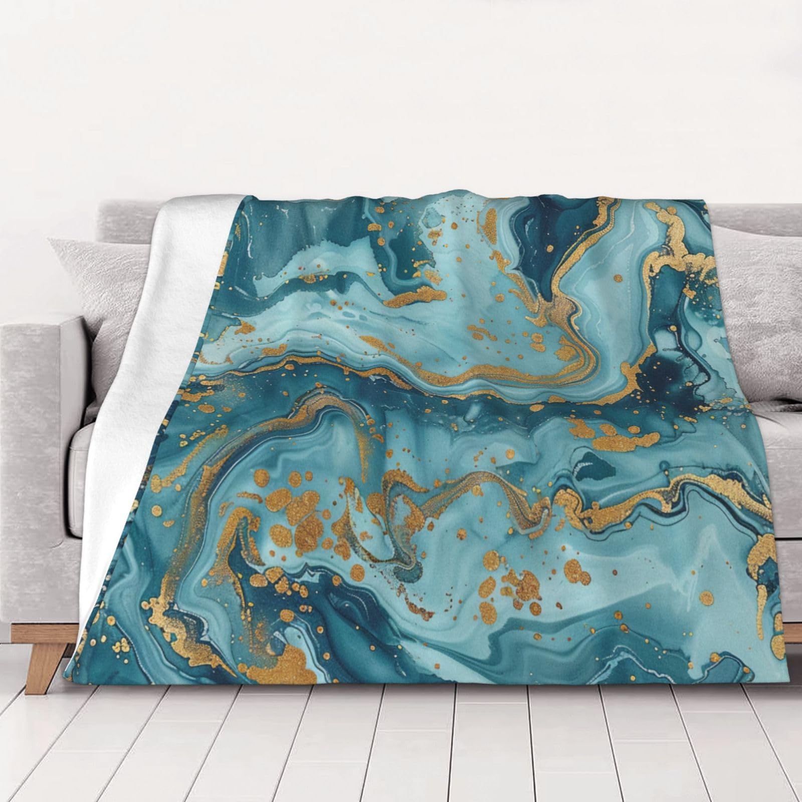 Couverture en flanelle marbre bleu pour des soirées cocooning au canapé