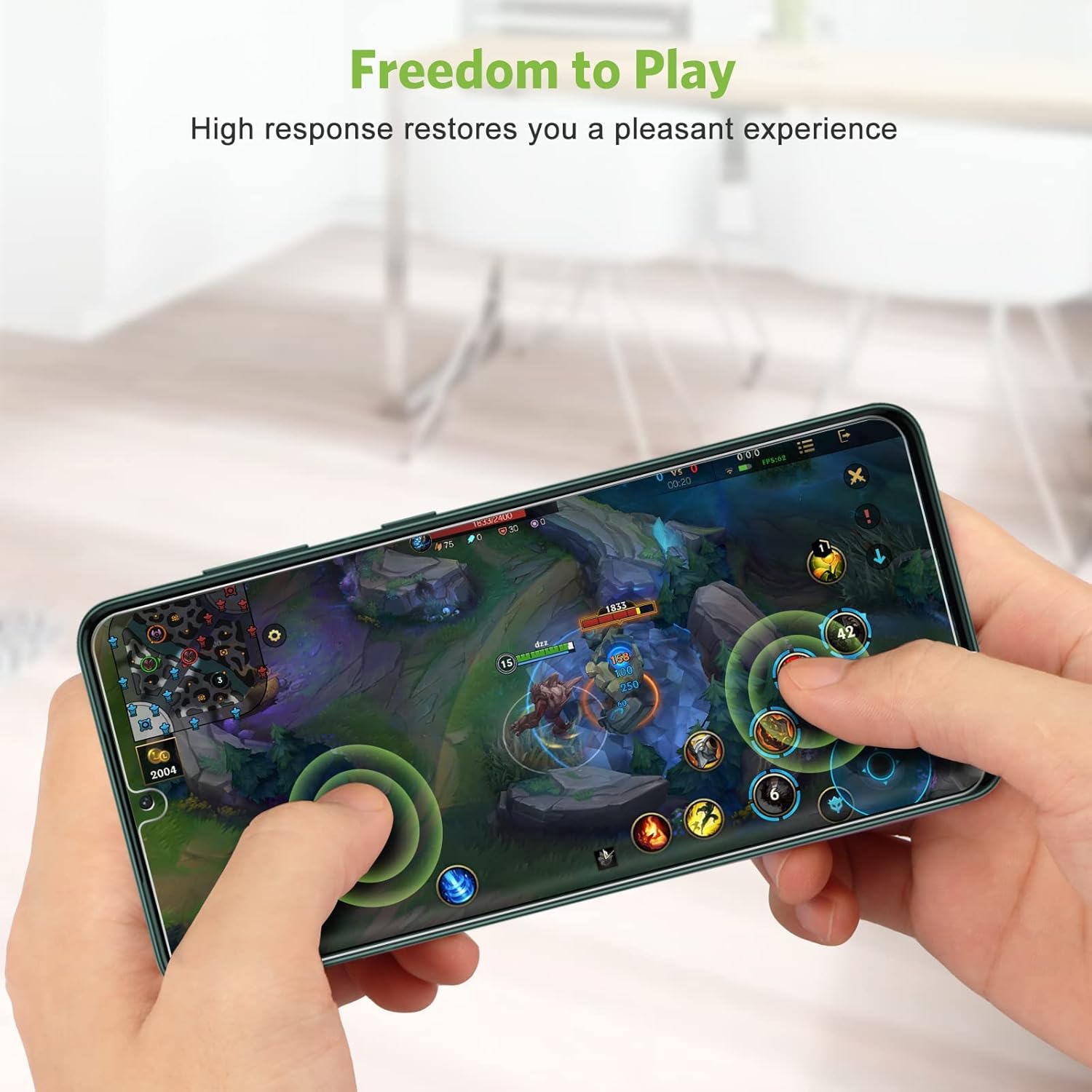 Person playing a game on a phone with screen protector, demonstrating high touch sensitivity