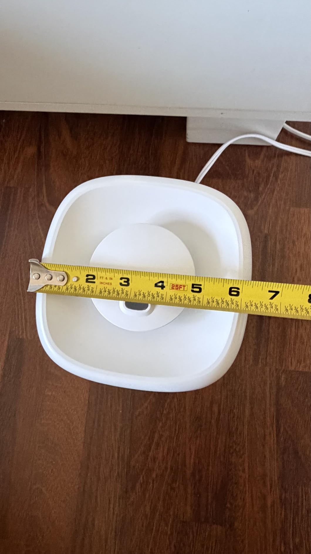 Levoit humidifier thickness shown, about 6.5 inches