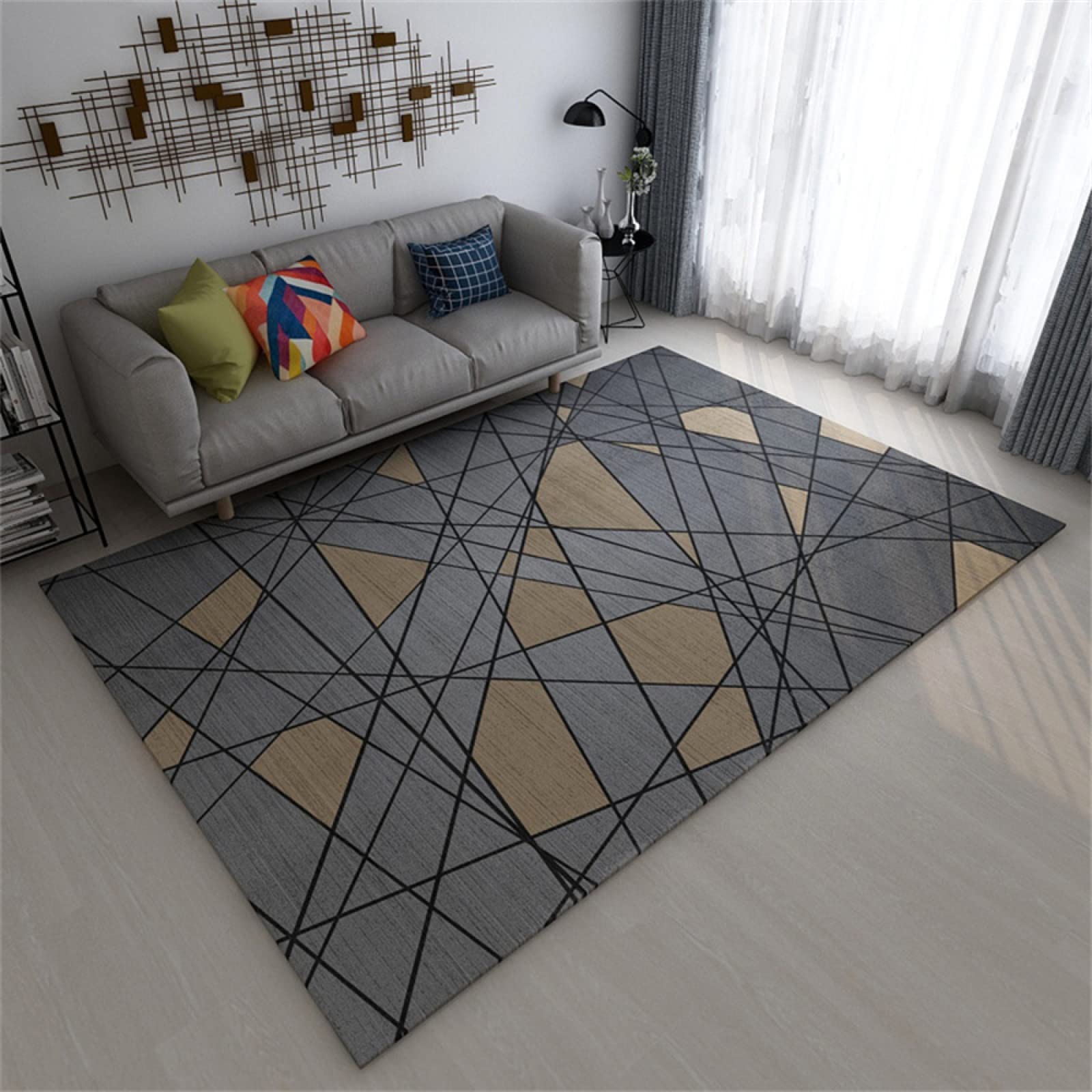 Tapis de terrasse extérieur noir pour aménager un salon de jardin design