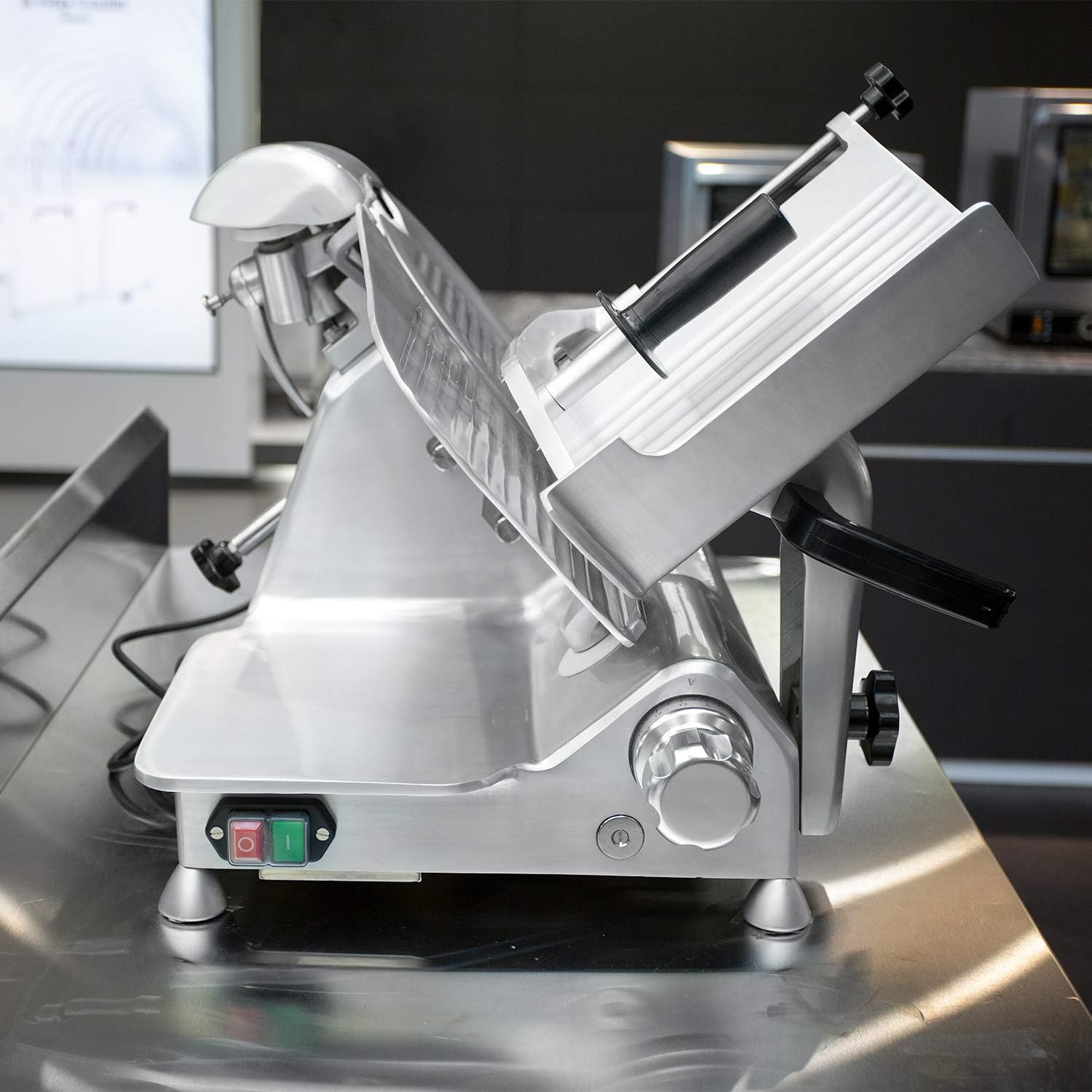 Diagram of KITMA Electric Deli Food Slicer with labeled parts including knife lock, removable parts, adjustable back plate, fixed handle, thickness adjustment, and power switch.