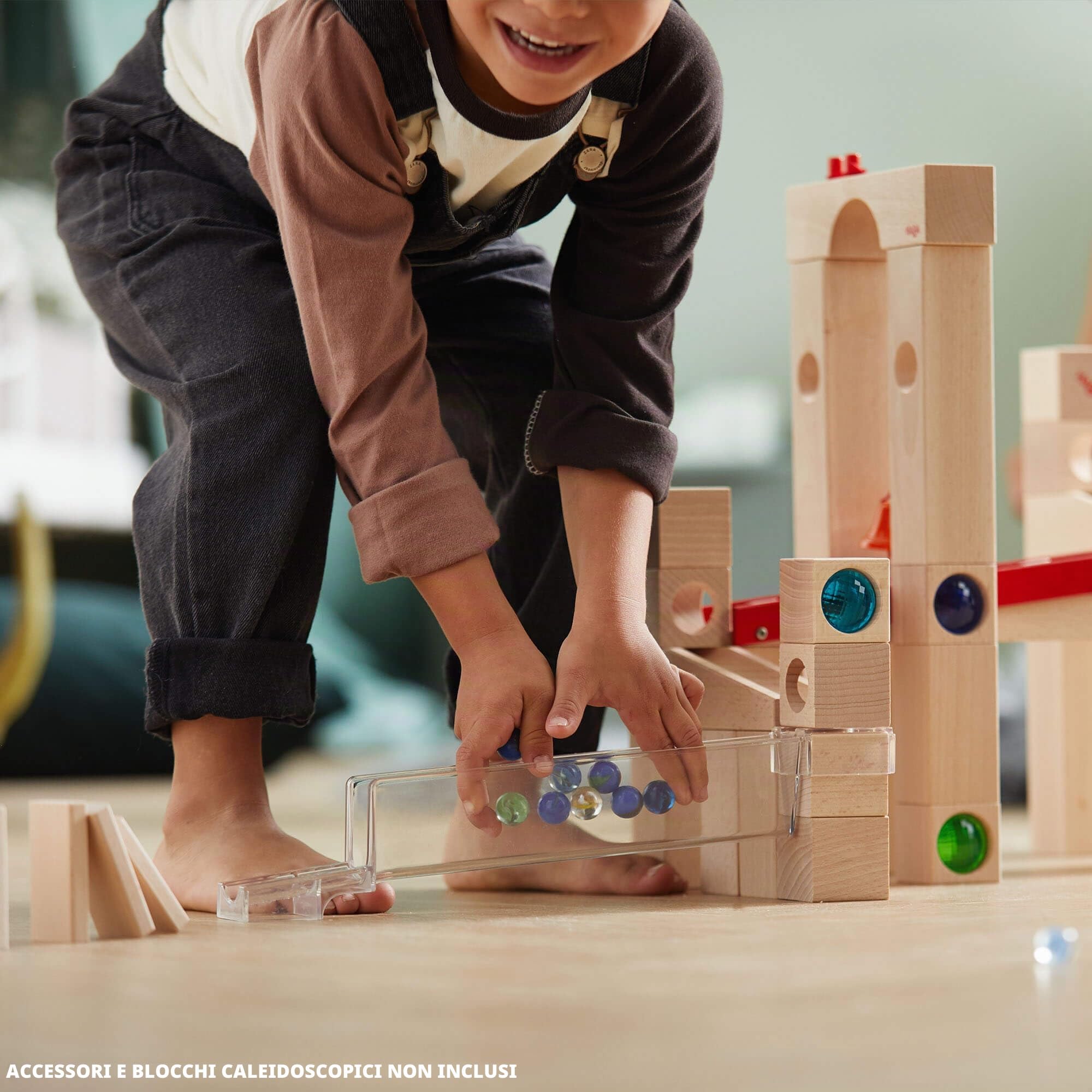 HABA 1136 Ball Track – Large basic pack- Large construction set with 42 beechwood pieces. Includes 6 glass marbles and a little bell. For ages 4 and Up (Made in Germany)