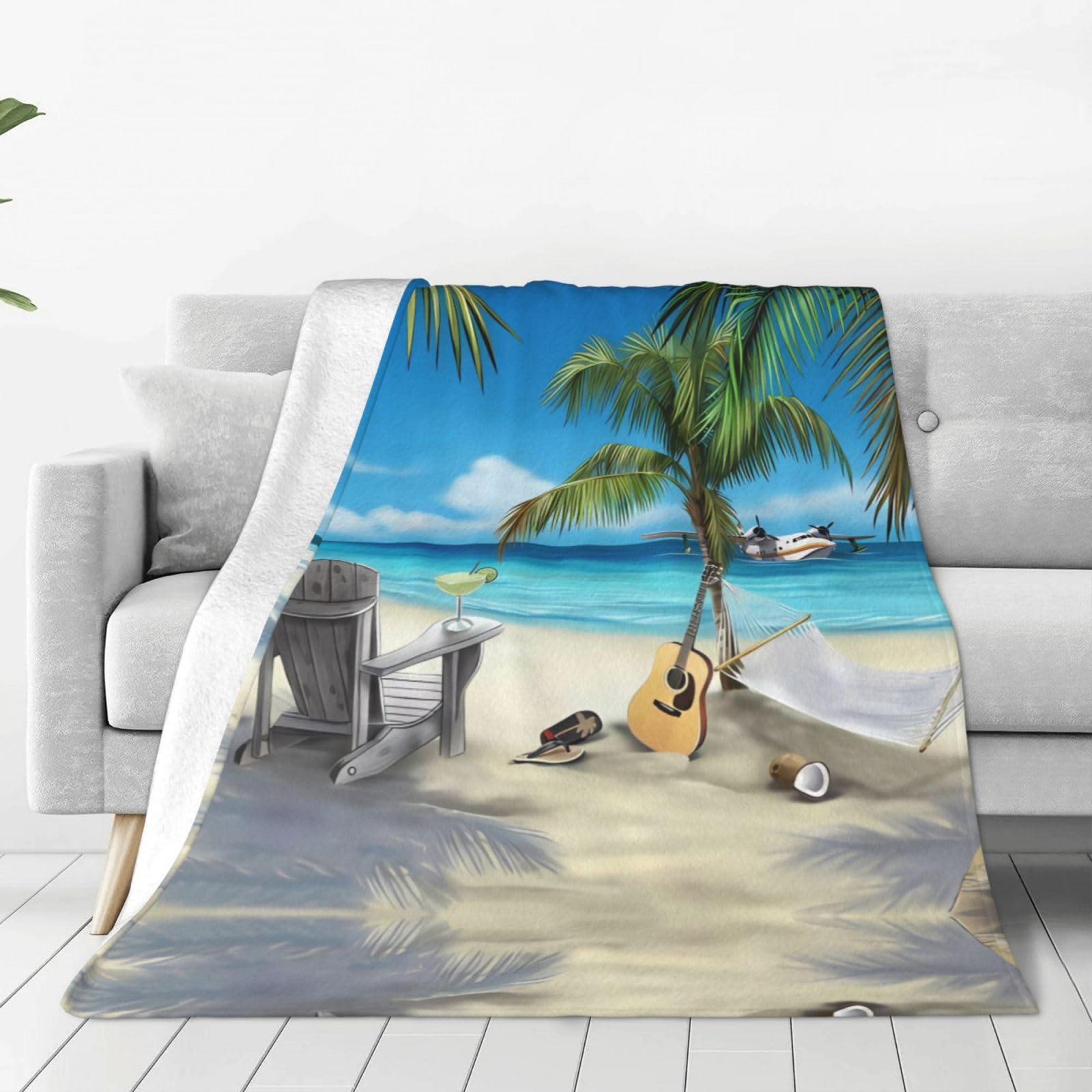 Couverture de plage en flanelle pour vos soirées fraîches sur le canapé ou au salon