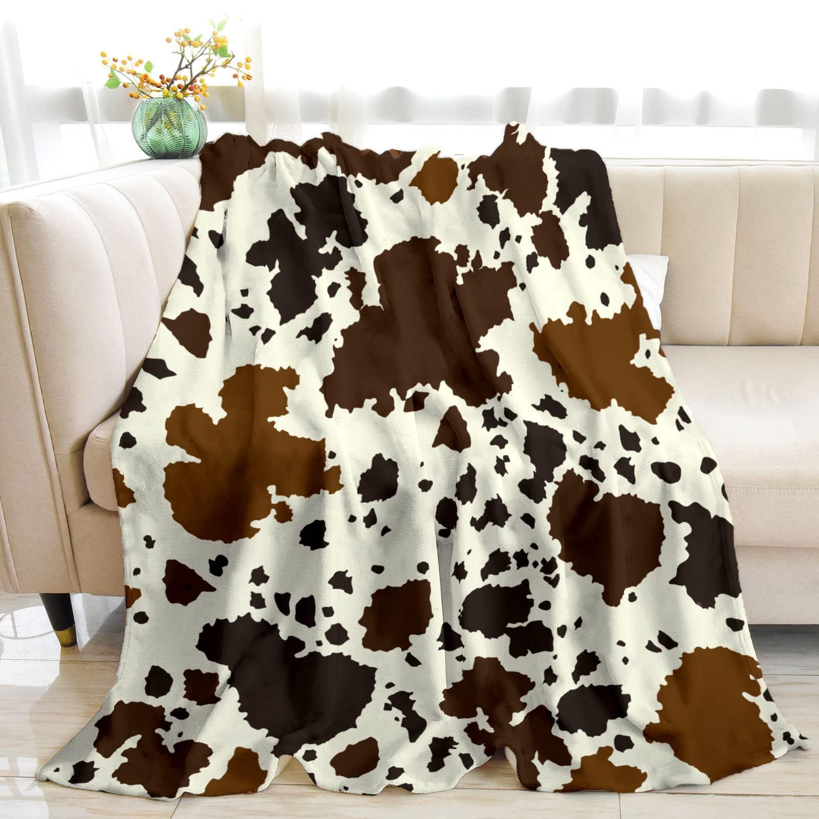 Couverture flanelle vache 150x200cm douce et finitions haut de gamme
