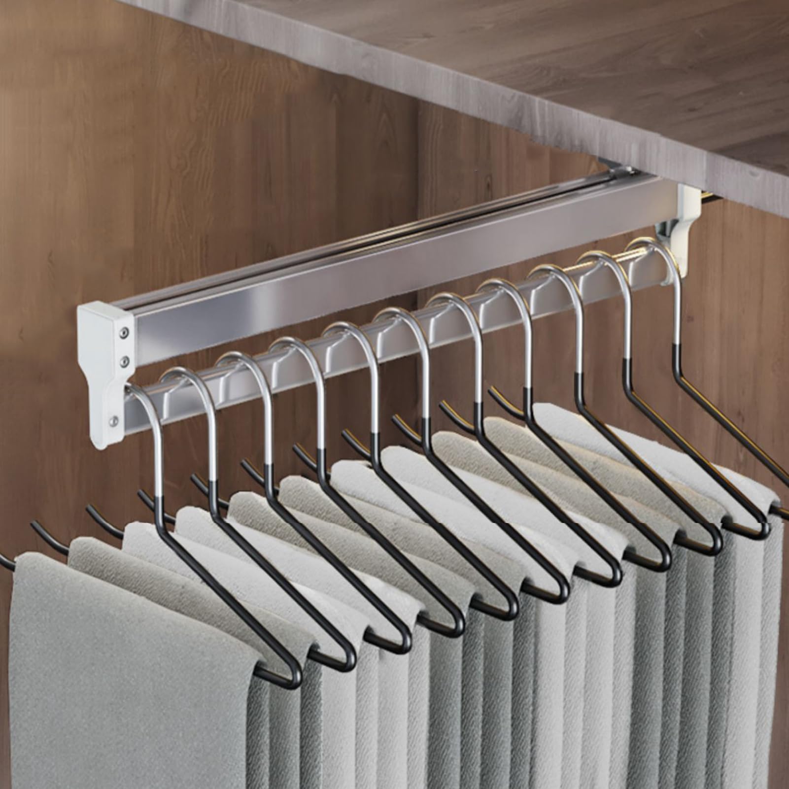 Penderie télescopique extensible noire pour suspendre manteaux et pantalons
