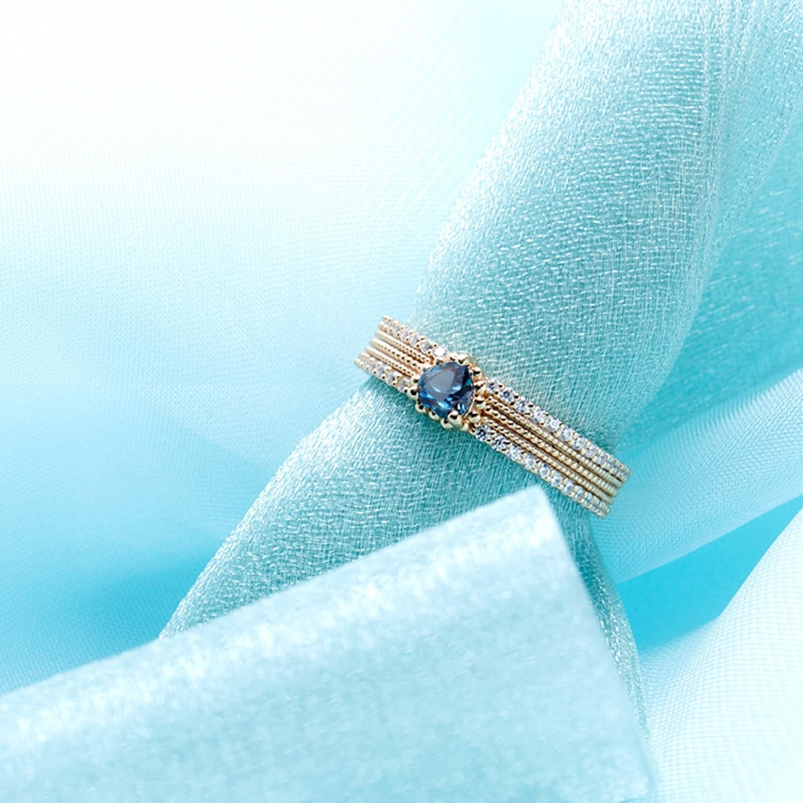 Anelli nuziali in oro 375/585/750 con cuore e topazio blu