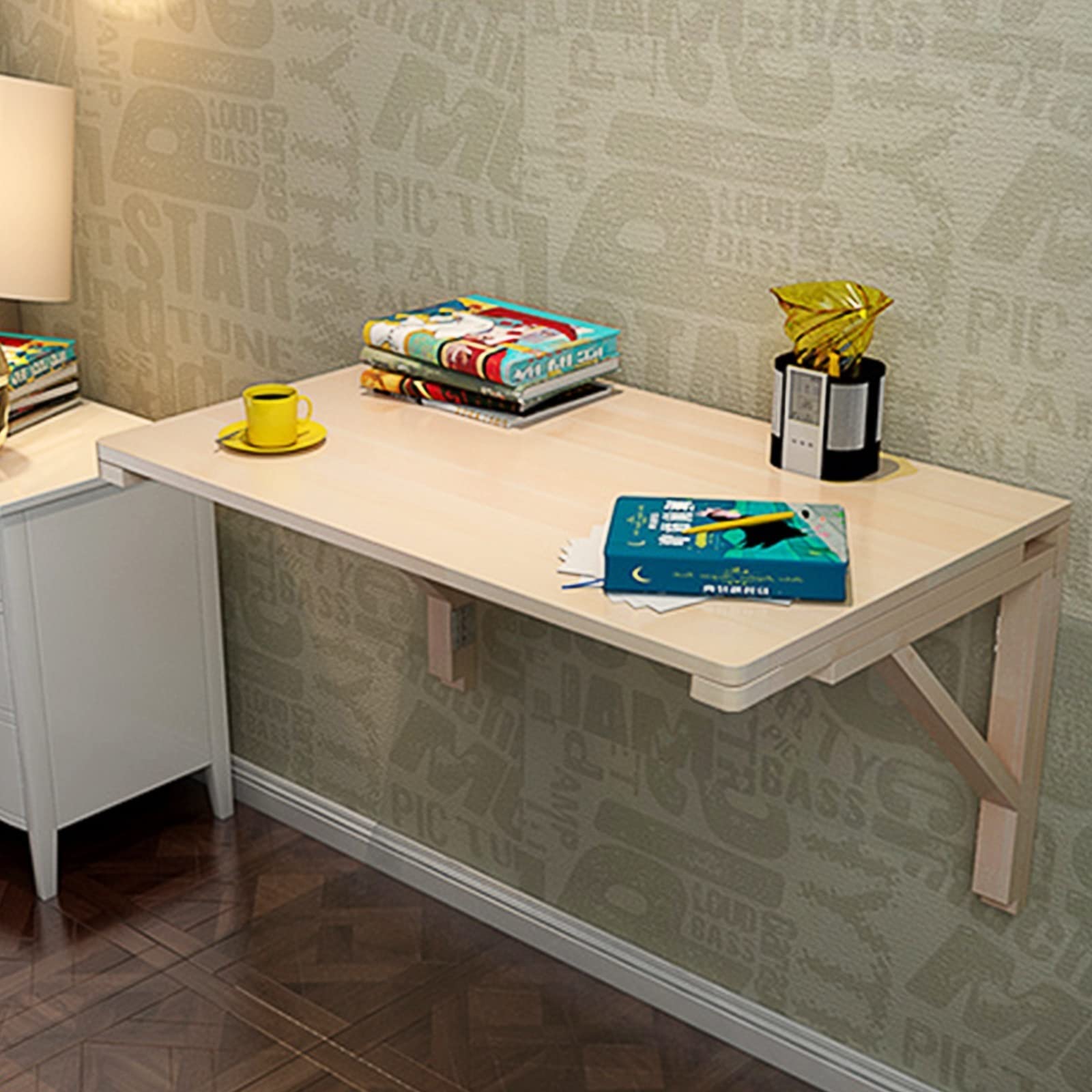 Bureau pliant mural compact idéal pour le télétravail dans un petit salon moderne