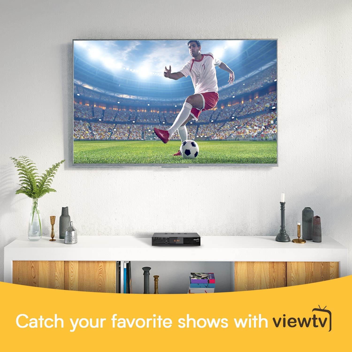 ViewTV AT-163 converter box placed on a TV stand in a living room
