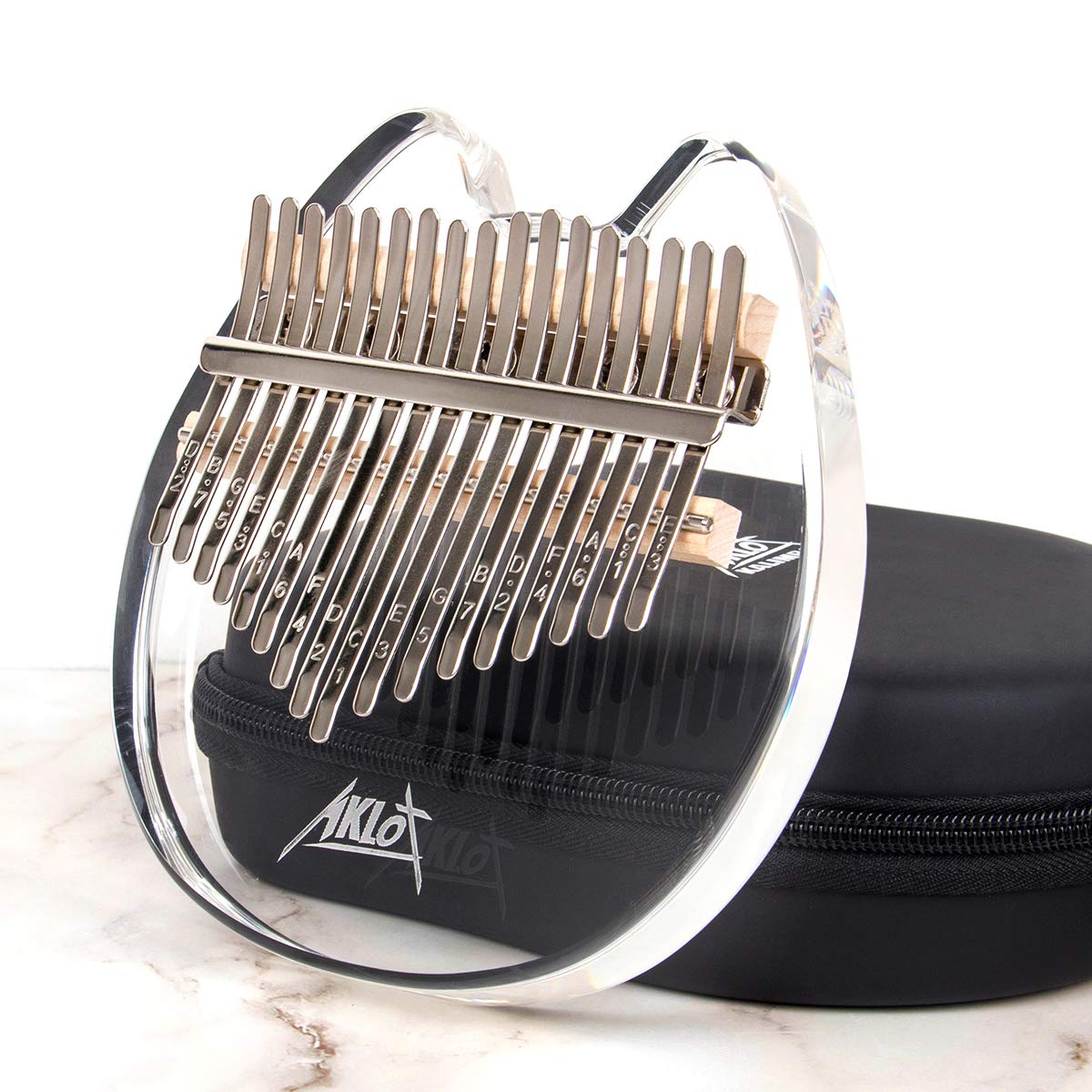 Kalimba Pouce Piano, AKLOT 17 touches Transparent Note de Chat Acrylique Sculpté Doigt de Démarreur Piano avec Kalimba Étui Tune Marteau Livre d'étude Autocollants